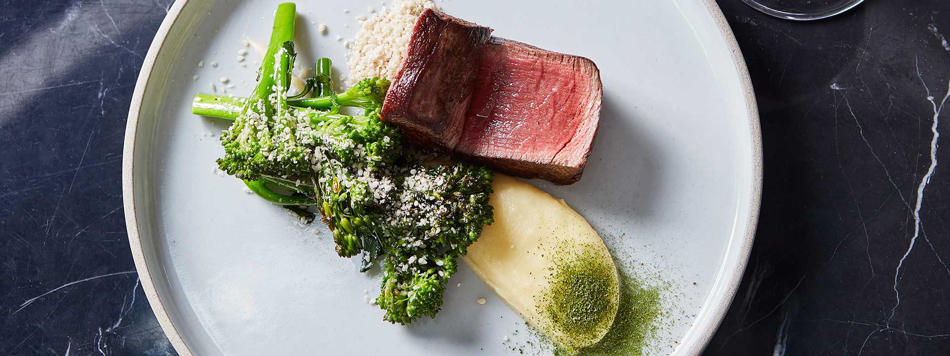 White plate with beef served at Jean-Georges at The Connaught in Mayfair