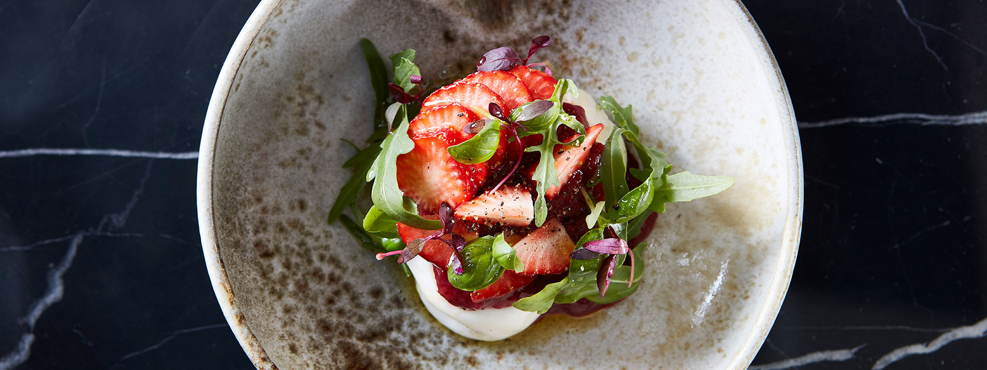 Strawberries with compote and green garnishes dessert at Jean-Georges at The Connaught